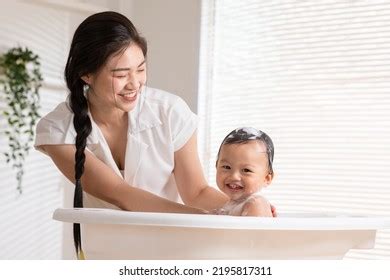 5,752 Mother Son Bath Images, Stock Photos, and。